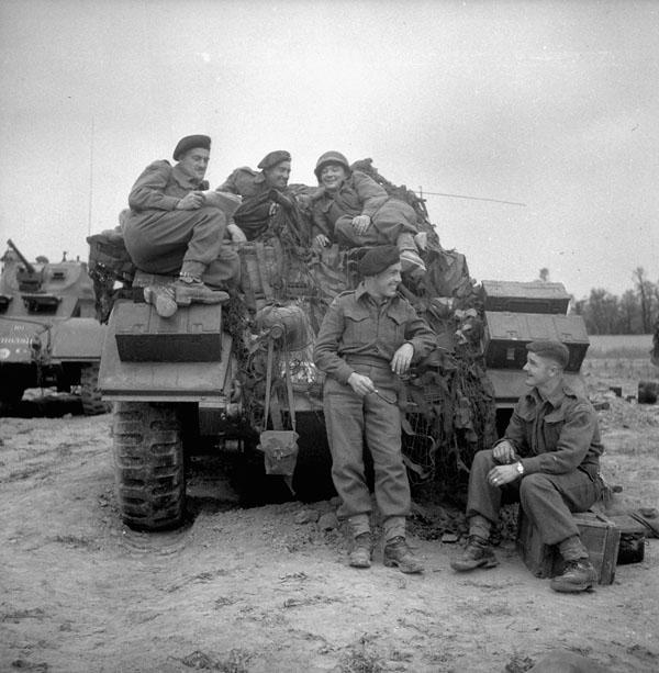 Photo of Piled on a Sherman Tank