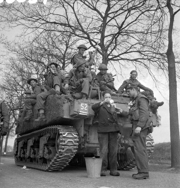 Photo of Riding on a Sherman Tank