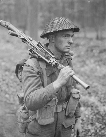 Photo of Shouldering the Bren Gun