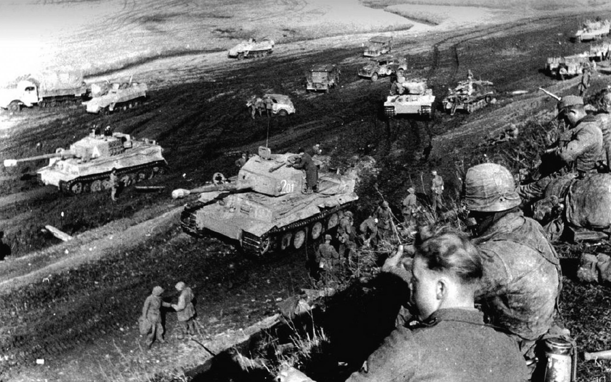 Photo of German Vehicles Navigate A Mud Pit