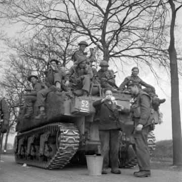 Riding on a Sherman Tank