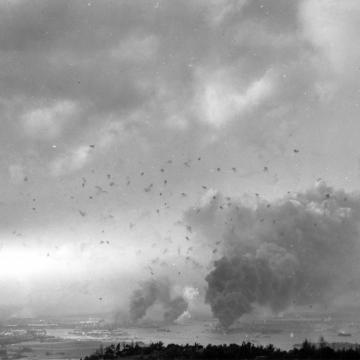 Anti-aircraft shell bursts blot the sky