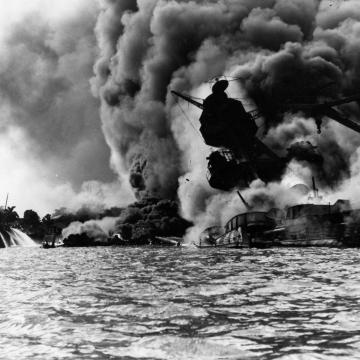 USS Arizona burning furiously