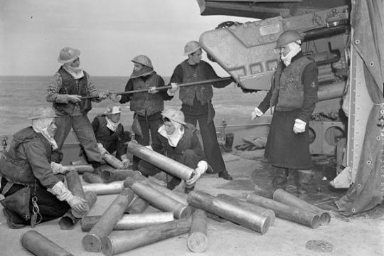 Piling Shell Casings - Royal Canadian Navy - War Photos